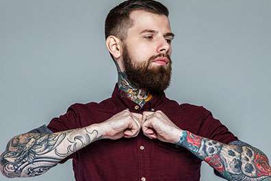 Our tattoo artists share what you need to know about tattoo cover up